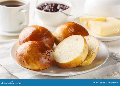 Soft And Delicious Norwegian Boller Cardamom Buns Served With Butter