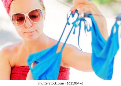 Woman Dries Blue Bikini On Clothesline ภาพสตอก 161106476 Shutterstock