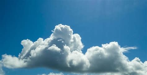 Premium Photo | White rain clouds in the summer sky natural clouds background