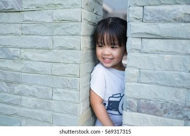 Little Girl Stuck Between Wall Getting Stock Photo 569317300 | Shutterstock