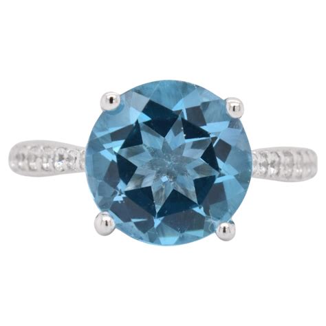 Round Natural Swiss Blue Topaz Rhodium Over Sterling Silver Ring For