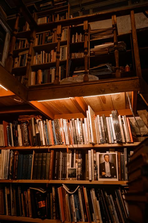 Table Lamp Near Bookshelves · Free Stock Photo