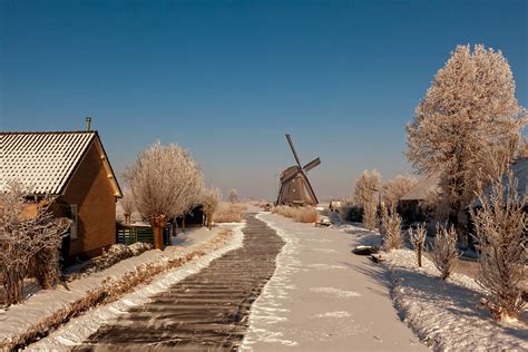 In Winter The Goudriaan Mill Along With The Church Dominat Flickr