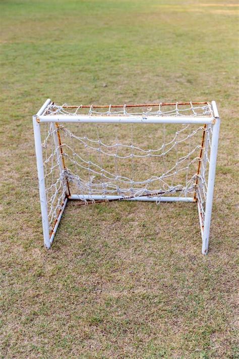 Mini Soccer Goal on the Green Grass Field. Outdoors Mini Football Court ...