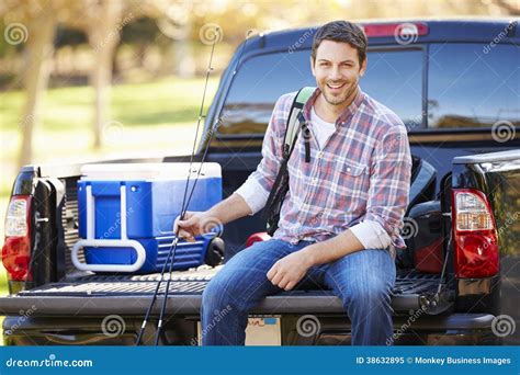 Man Sitting In Pick Up Truck On Camping Holiday Stock Image Image Of