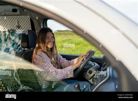 Happy Young Woman Driving Camper Van Stock Photo Alamy