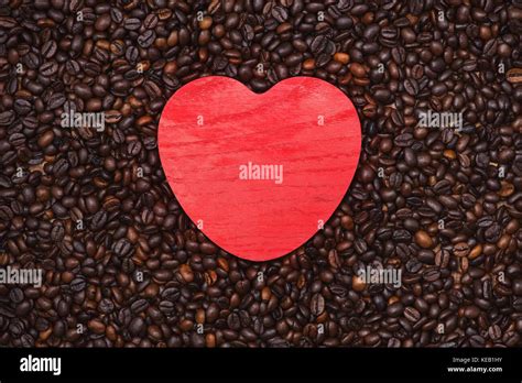 Red Wooden Heart Shape On Coffee Beans Background Stock Photo Alamy