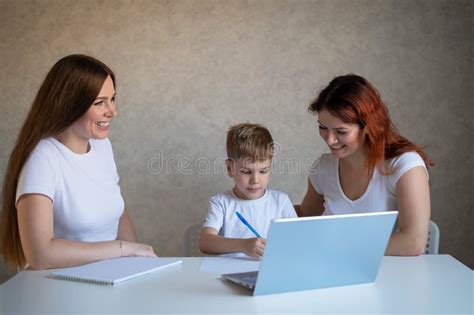 Same Sex Mothers Kissing Their Daughter Stock Photo Image Of Yrs Donation