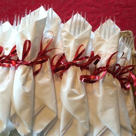 Forks Wrapped With White Napkins Tied With Red Ribbon Valentine