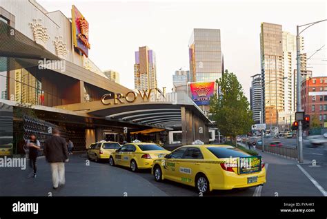 A photo of Crown casino entrance with a taxi cars near doors Stock ...