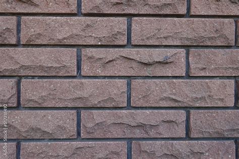 Texture Of Brown Brick Veneer Wall With Black Mortar Joints Stock Photo