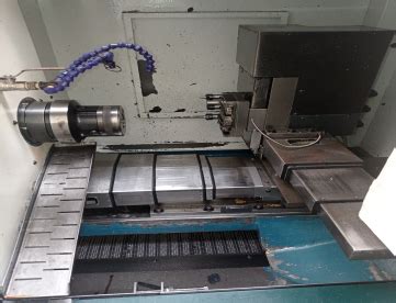 TORNO CNC INTERTECH HIDRÁULICO ALIMENTADOR DE BARRAS ANO 2001