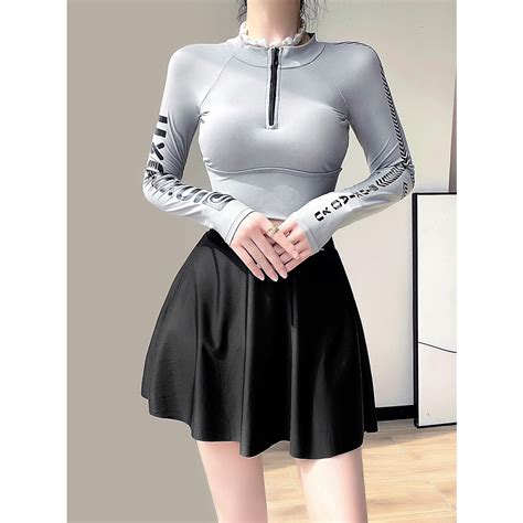Đồ bơi nữ chân váy kín đáo tay dài chống nắng Bikini nữ hai mảnh đi biển dáng thể thao Shopee