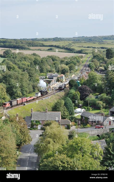 A Short Goods Train Approaches Corfe Castle Station On The Preserved