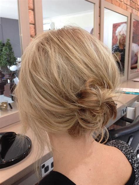 Short Hair Low Messy Bun Wavy Haircut