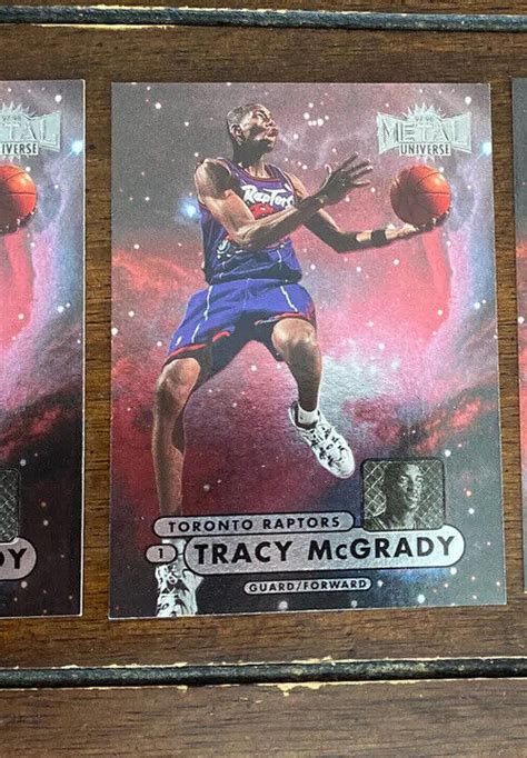 1997 98 Skybox Metal Universe Tracy McGrady 34 Rookie Card RC Raptors