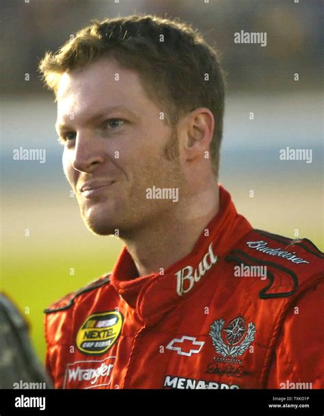 Race Car Driver Dale Earnhardt Jr Stands On Pit Road Before The Start