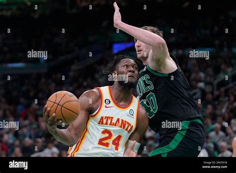 Atlanta Hawks forward Bruno Fernando (24) drives toward the basket as ...