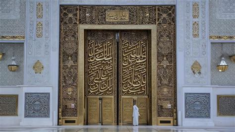 Premium Photo Makkah Kaaba Door With Verses From The Qoran Holy Book