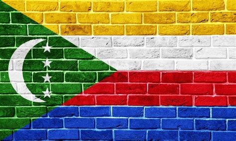 Bandeira Da União Das Comores Em Um Fundo Texturizado Colagem Conceitual Foto Premium