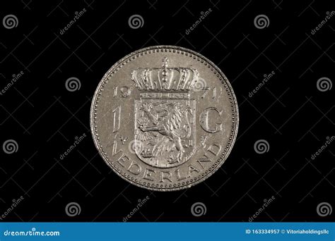 An Old One Dutch Guilder Coin on Black Stock Image - Image of isolate ...