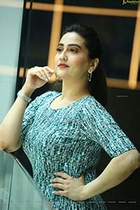 Anchor Manjusha Latest Photoshoot Stills HD Photo Gallery