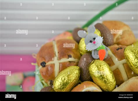 Easter Food In A Basket With Hot Cross Buns And Golden Chocolate Easter Eggs With Easter Bunny