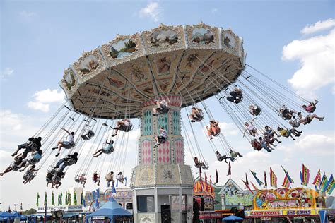 Swing Carousel At County Fair Photograph By William Kuta