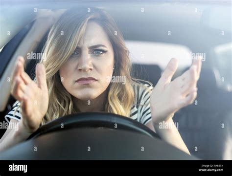 Angry Woman Driving A Car Stock Photo Alamy