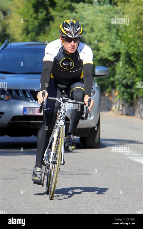 Lance Armstrong Who Recently Denied Allegations Of Doping By A Former Teammate Cycling With A