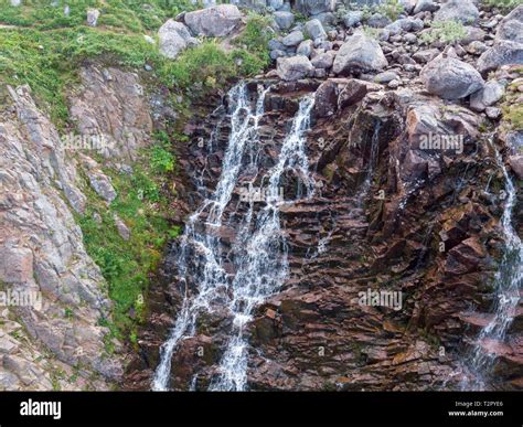 Mountain Waterfall with Drone Stock Photo - Alamy