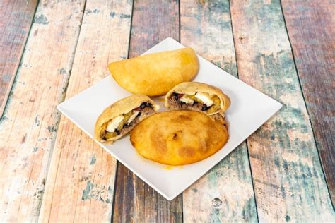 Premium Photo Venezuelan Empanadas Stuffed With Meat With Beans And