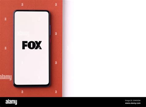 Fox Broadcasting Company logo on phone screen stock image Stock Photo - Alamy