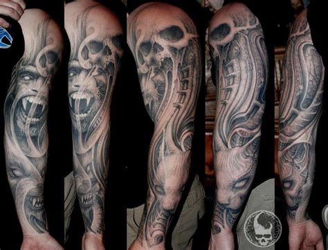 Bio skull demon arm sleeve by Paul Booth: TattooNOW