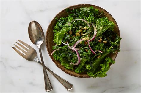 Kale and Mustard Greens with Pepitas and Red Onion | Bon Appétit