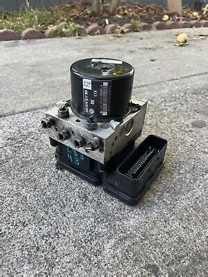 2009 VW JETTA GOLF GTI EOS ANTI LOCK ABS PUMP WITH CONTROL MODULE 1K0