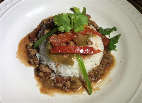 Slow Cooked Sirloin Pepper Steak Over Rice Articles