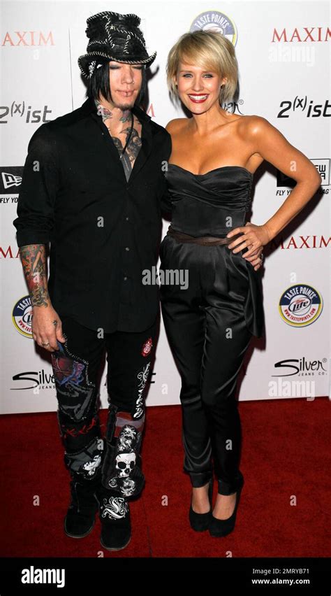 Dj Ashba L And Actress Nicky Whelan Arrive At The 2011 Maxim Hot 100