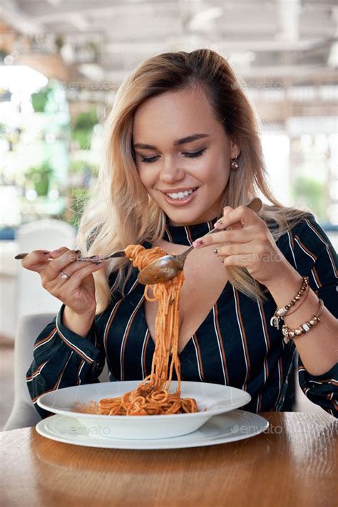 Sensual Woman Rolling Spaghetti And Keeping On A Fork To Eat Sensual