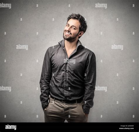 Bearded man smiling Stock Photo - Alamy