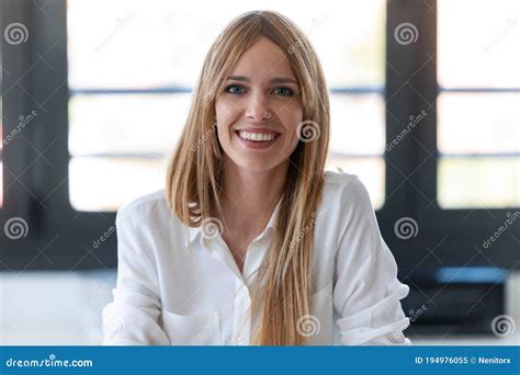 Pretty Young Woman Blogger Smiling While Making Social Media Video