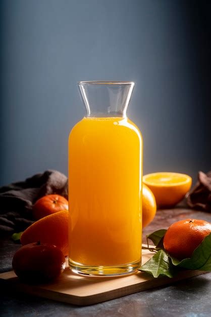 Free Photo | Delicious orange juice in bottle