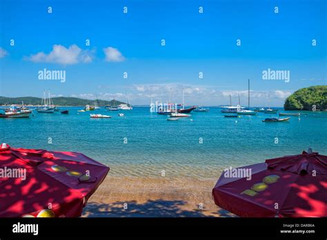 Praia Ossos Umbrellas And Beach Buzios Rio De Janeiro Brazil Stock