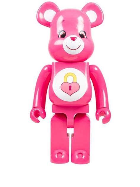 A Pink Bear Toy With A Lock On It S Chest And Eyes Are Shown