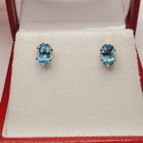 Gold Blue Topaz Stud Earrings 10k Yellow Gold Blue Topaz 6x4mm Stud