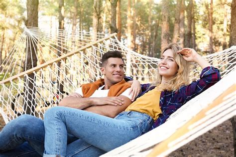 Premium Photo Happy Couple Resting In Hammock Outdoors On Summer Day