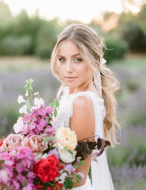 Blond Bride With Colorful Wedding Bouquet In Lavender Feminine