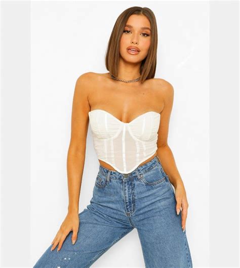 Buy Boohoo Mesh Boned Dip Hem Corset Top In White 6thstreet Uae