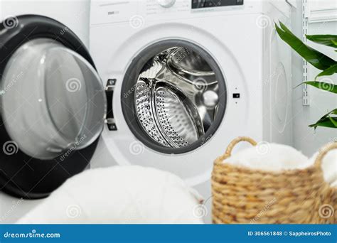 Open Door of Front Load Washing Machine in Laundry Room Stock Photo ...