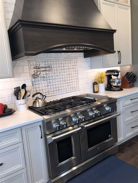 Taupe Cabinets Dark Wood Range Hood Oversized Carerra Subway Tiles